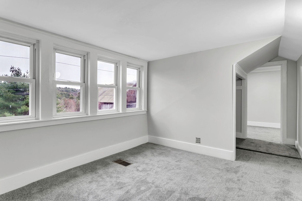 140 Greenwich Plains Road Ware, MA 01082 - Photo 32 of 42 a view of an empty room with a window