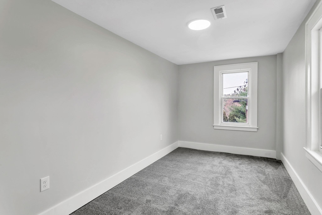 140 Greenwich Plains Road Ware, MA 01082 - Photo 33 of 42 an empty room with a window