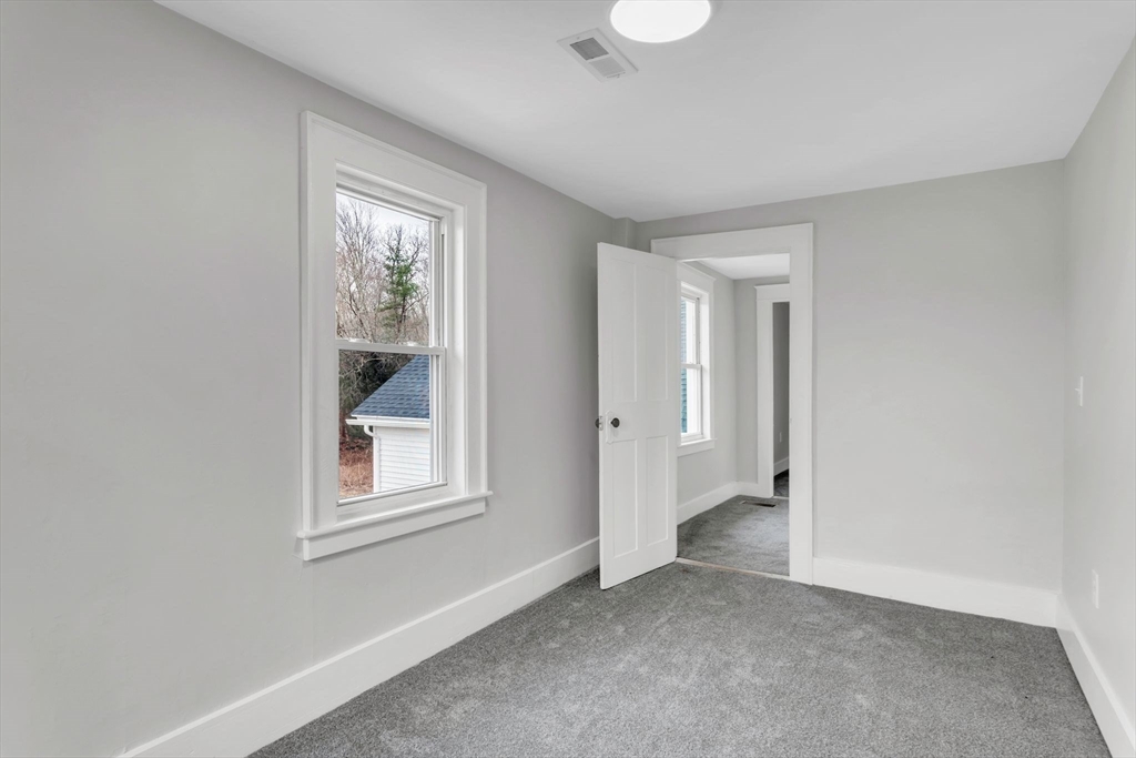 140 Greenwich Plains Road Ware, MA 01082 - Photo 34 of 42 a view of an empty room with a window