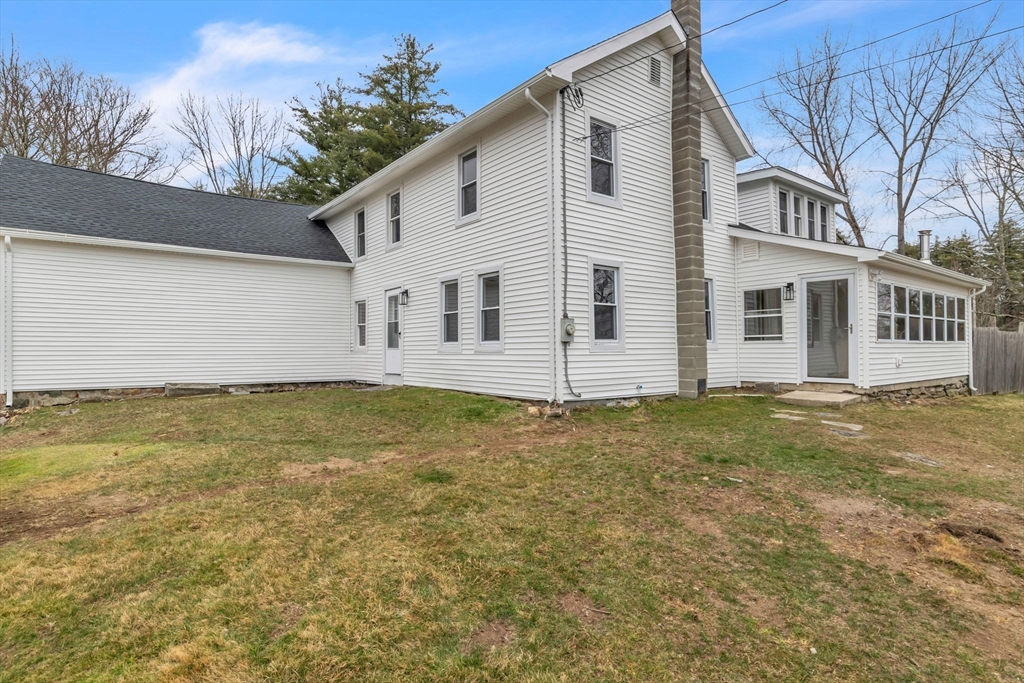 140 Greenwich Plains Road Ware, MA 01082 - Photo 41 of 42 a view of a large white house with a large yard