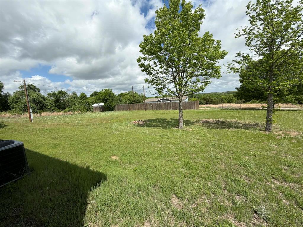 1085 Highland Circle Springtown, TX 76082 - Photo 23 of 29 only 1 visible neighbor, with privacy fence in between