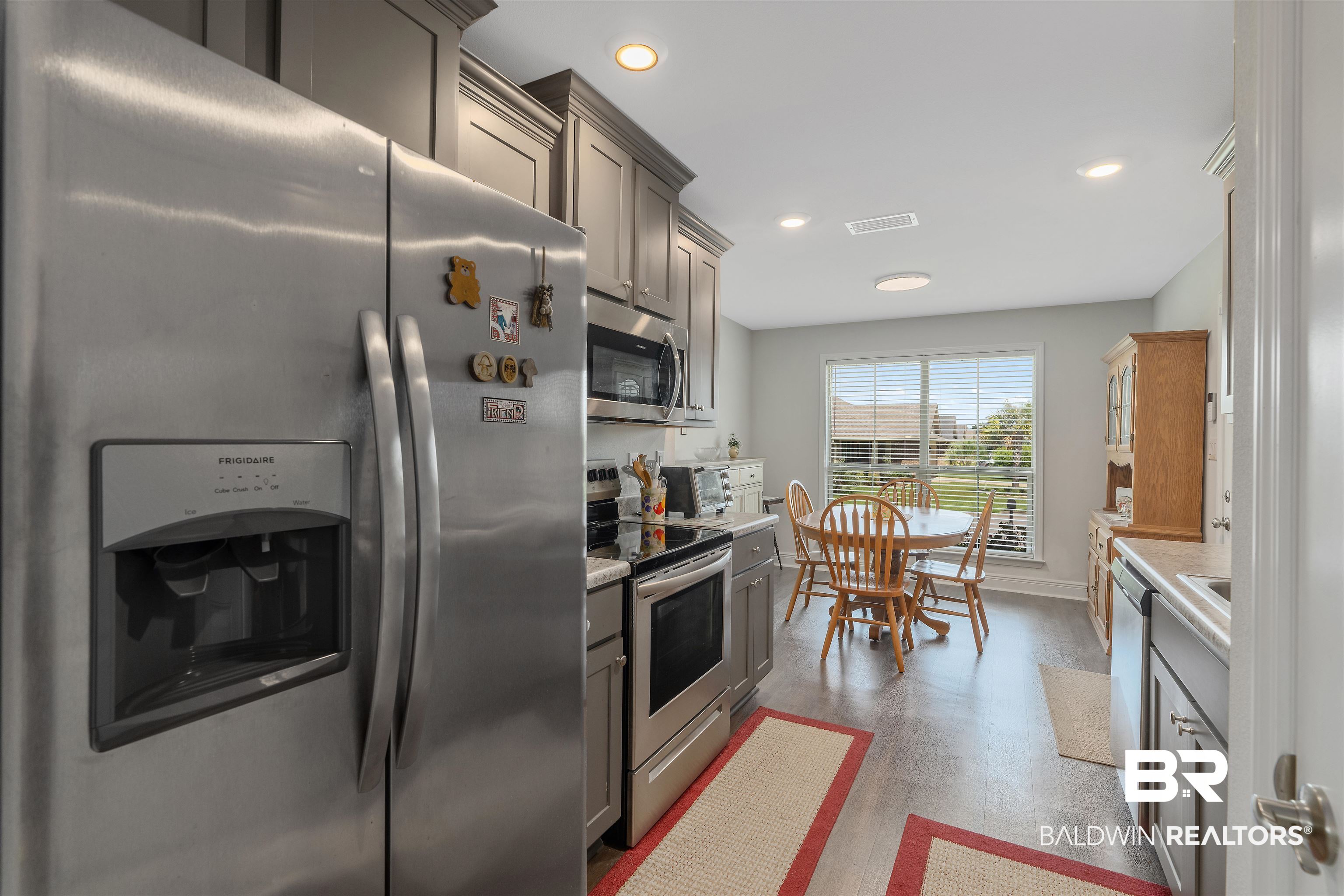 8823 Allay Lane Foley, AL 36535 - Photo 3 of 18 Kitchen with stainless steel appliances and light hardwood / wood-style flooring