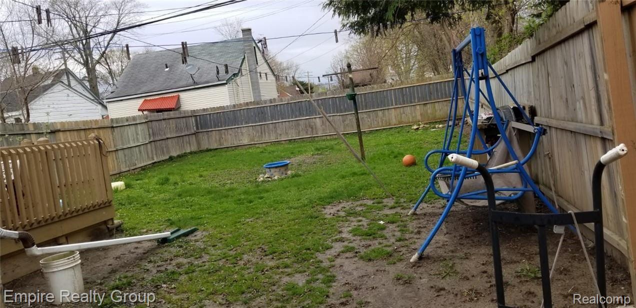 6614 Rutherford Street Detroit, MI 48228 - Photo 22 of 22 BIG BACK YARD WITH PRIVACY FENCE.jpeg