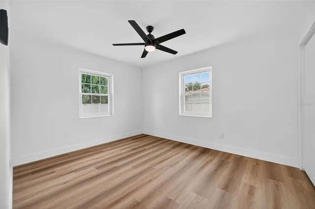 a view of a house with a big yard