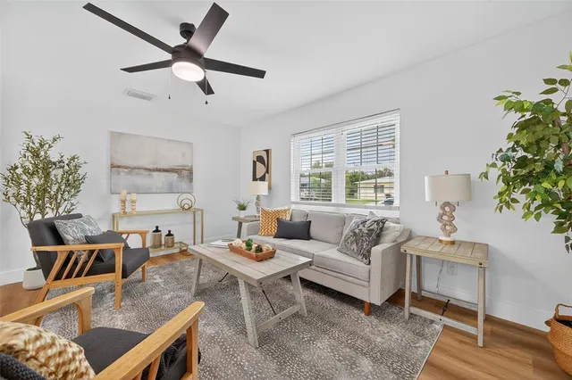 a kitchen with sink a stove and refrigerator