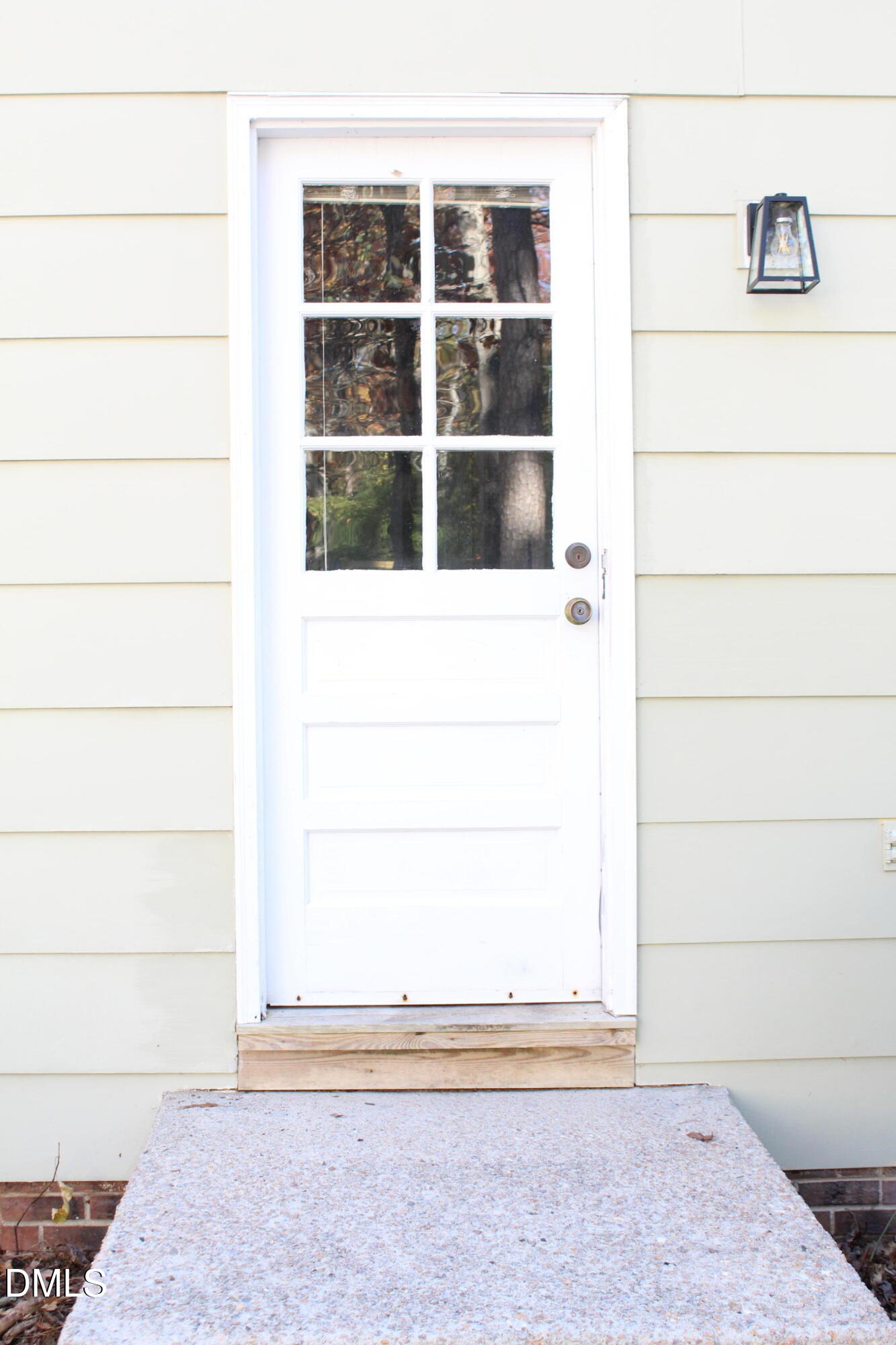 7609 Gold Mine Court Raleigh, NC 27615 - Photo 2 of 36 Side Entry Door to Kitchen
