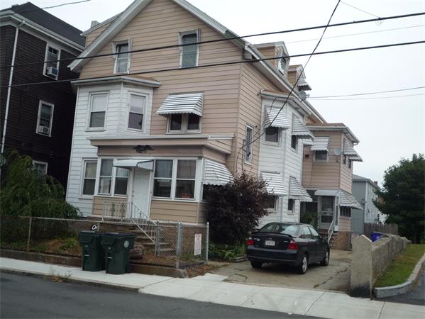 682 Second Street Fall River, MA 02721 - Photo 1 of 1 a car parked in front of a white house