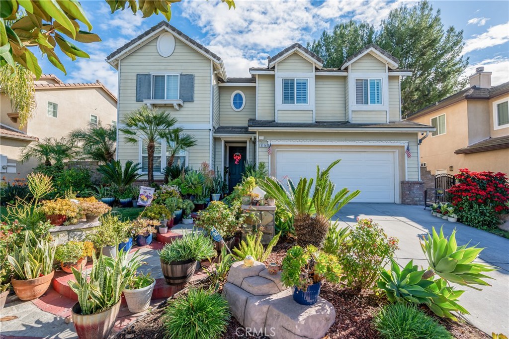 3114 Highlander Road Fullerton, CA 92833 - Photo 1 of 1 a front view of a house with a yard