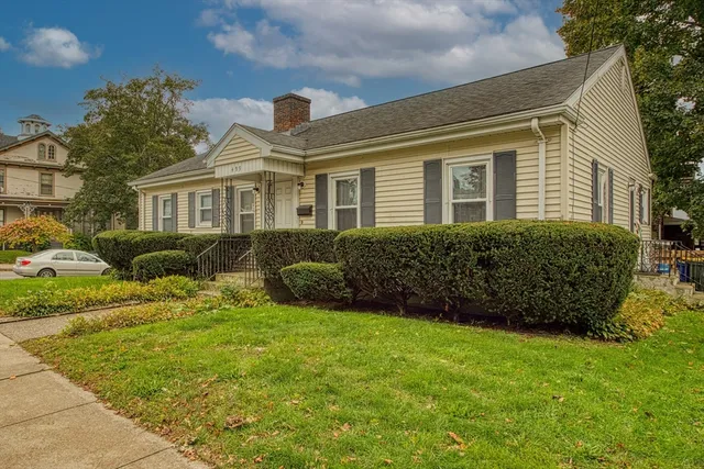 a view of a house with a garden