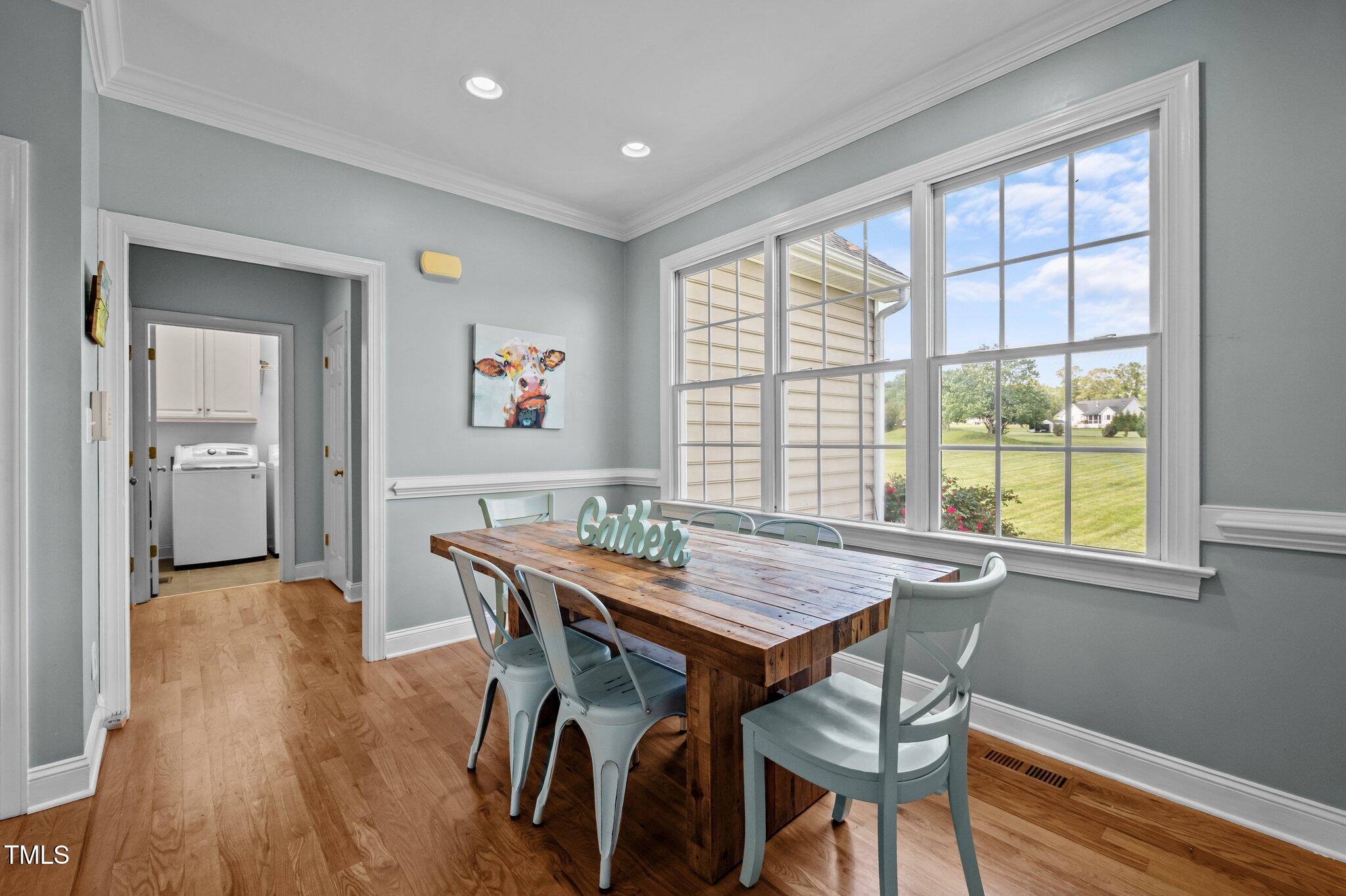 281 Derwin Drive Timberlake, NC 27583 - Photo 12 of 29 a dining room with furniture and window