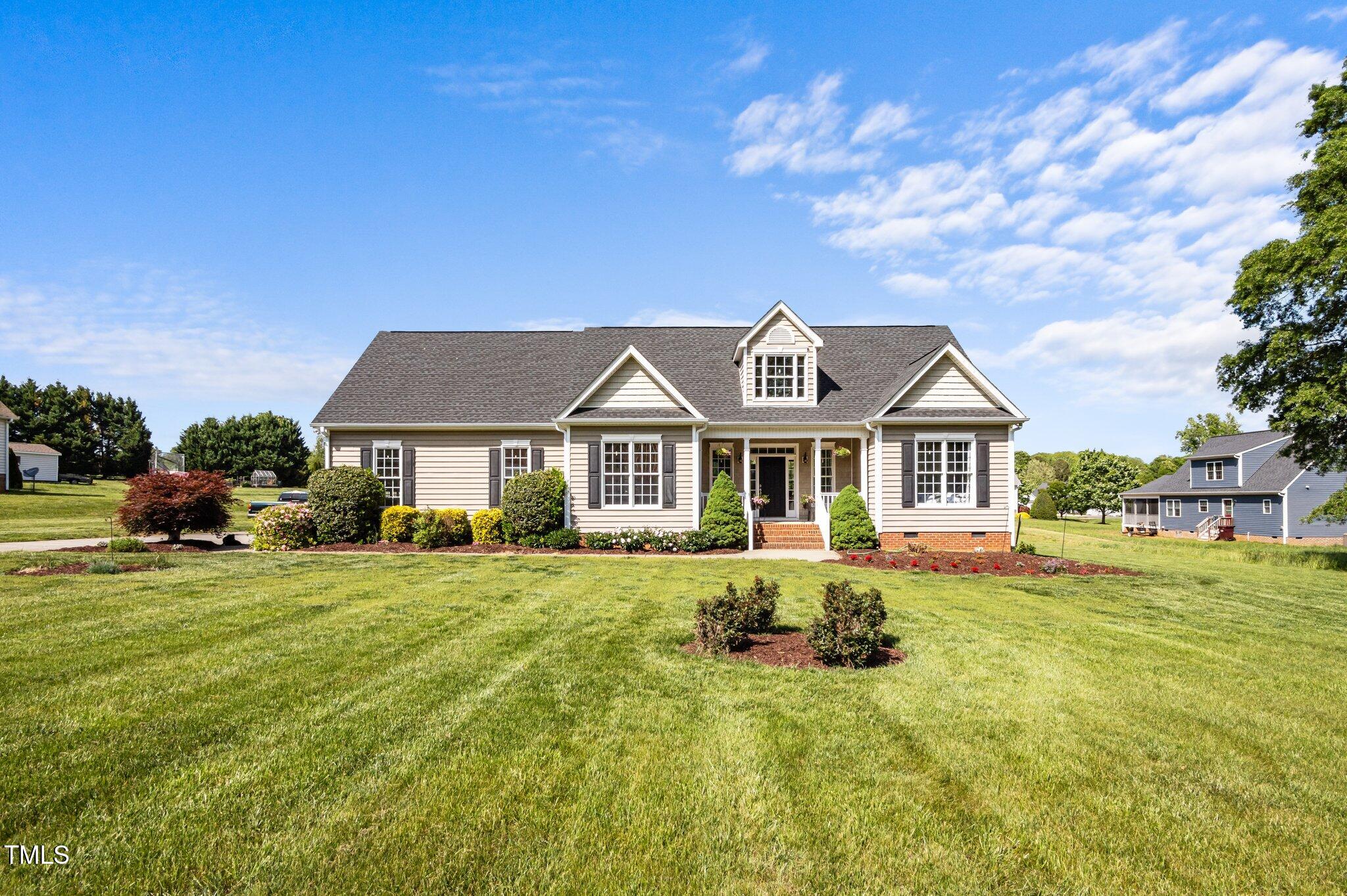 281 Derwin Drive Timberlake, NC 27583 - Photo 29 of 29 a front view of a house with a yard