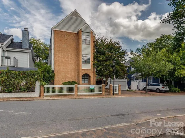 a view of a building with a street