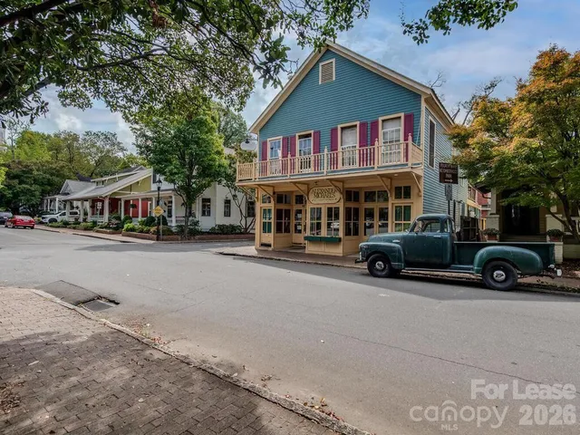 a front view of building with street