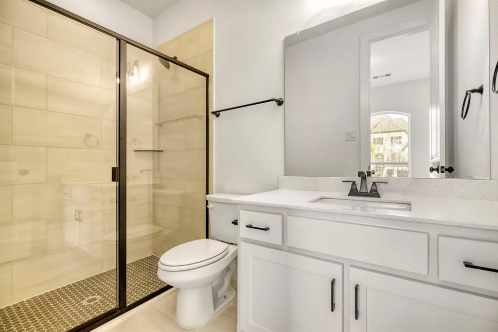 4312 Double Diamond Prosper, TX 75078 - Photo 22 of 29 a bathroom with a sink a toilet and shower