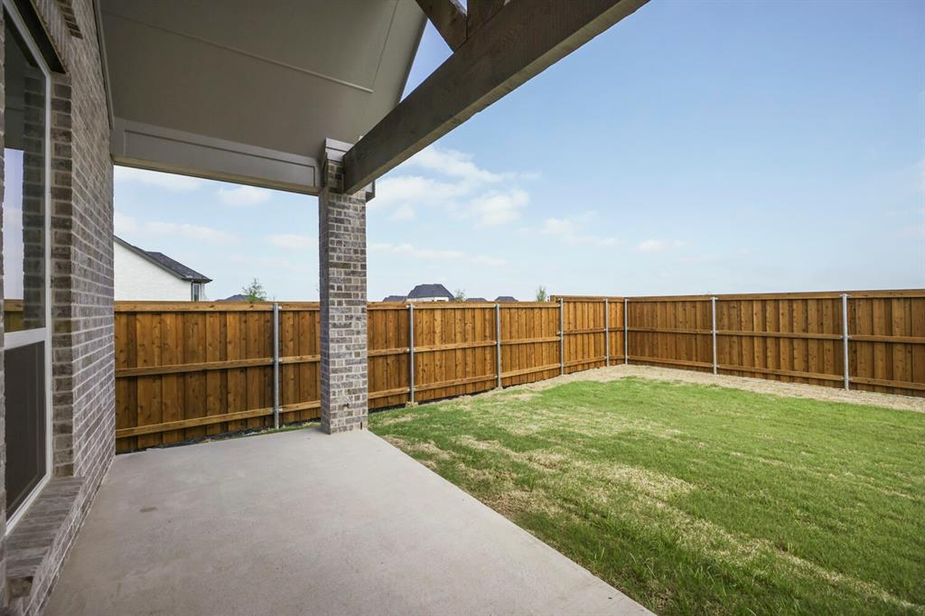 4312 Double Diamond Prosper, TX 75078 - Photo 25 of 29 a view of outdoor space with wooden fence