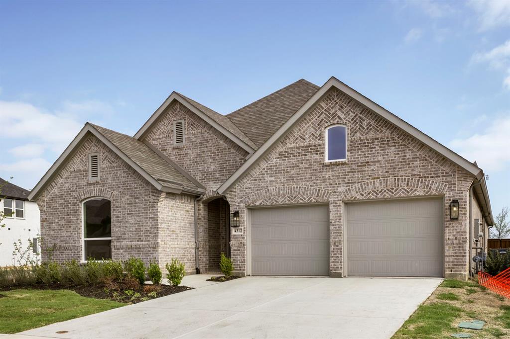 4312 Double Diamond Prosper, TX 75078 - Photo 29 of 29 a front view of a house with a yard and garage