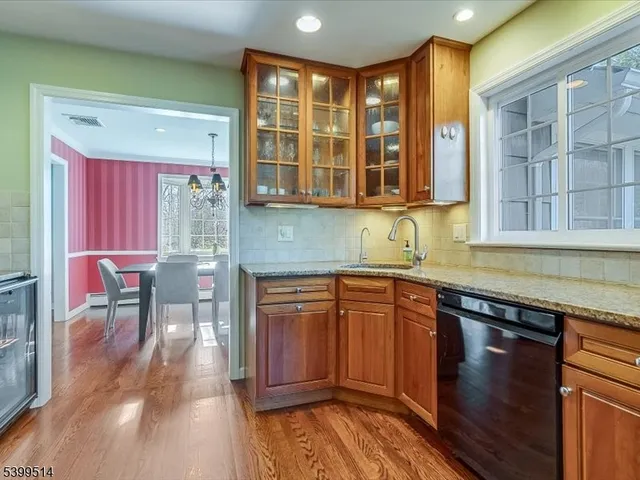 a bathroom with a sink a vanity and a mirror