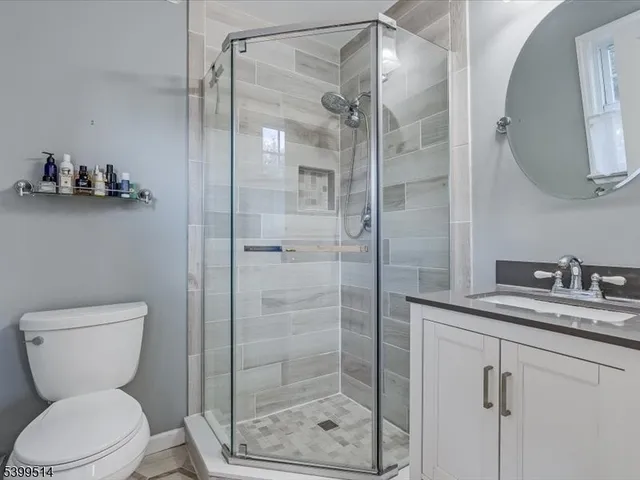 a black and white photo of a bench