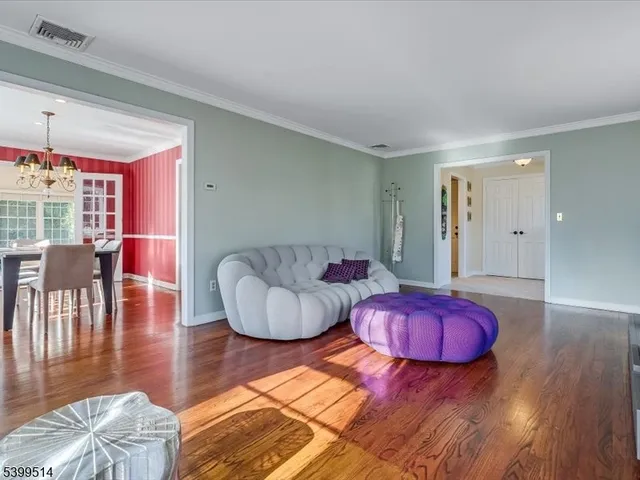 a bathroom with a toilet a sink and a mirror