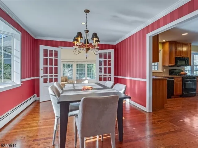 a kitchen with stainless steel appliances granite countertop a stove and a sink