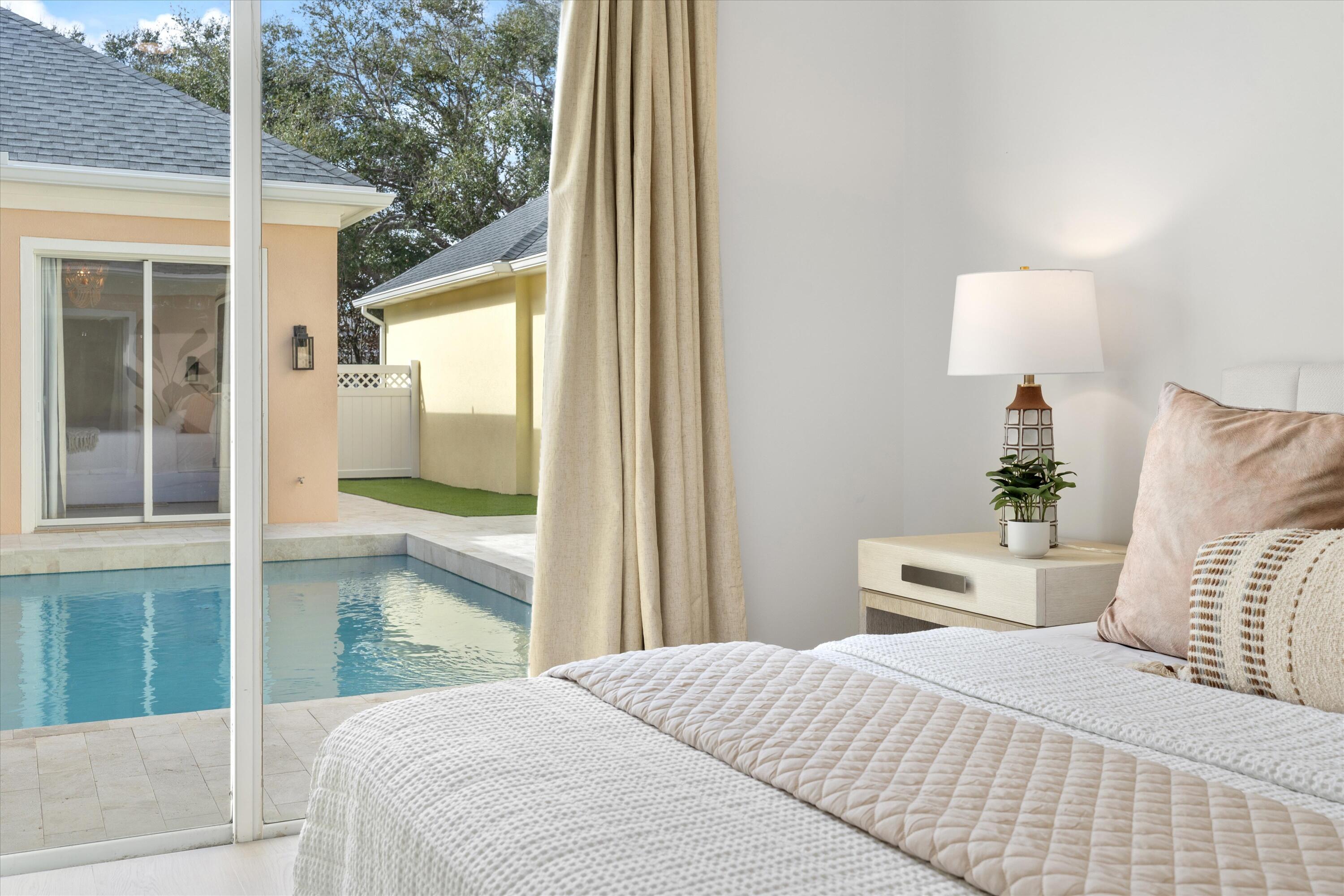 176 Paradise Circle Jupiter, FL 33458 - Photo 23 of 35 2nd Guest Room view to Pool