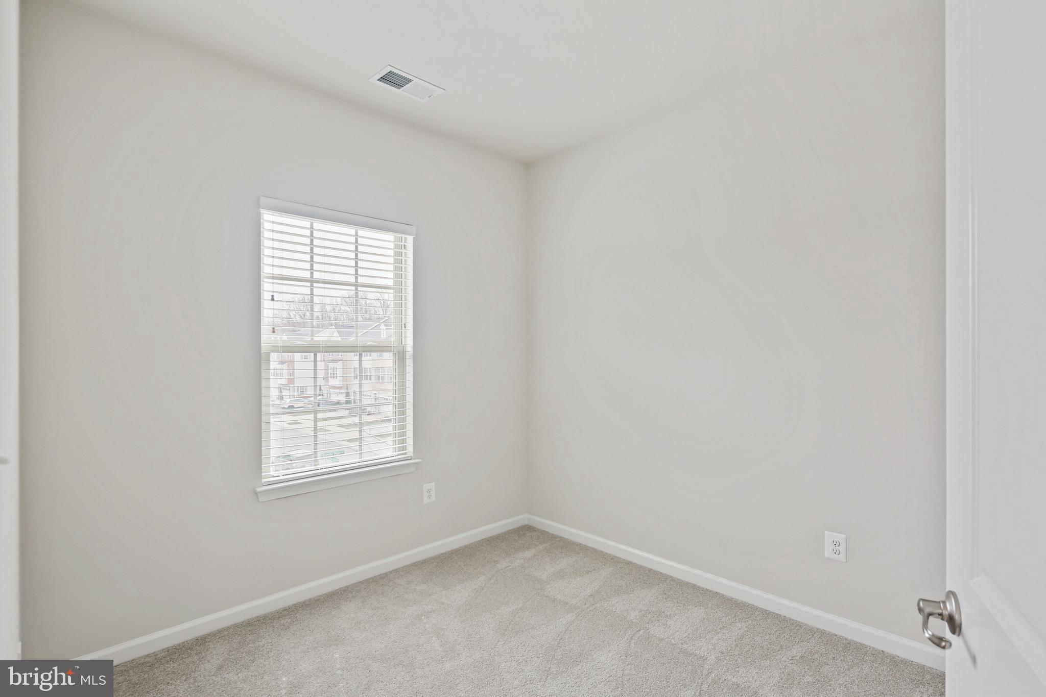 10012 Sandy Run Road Baltimore, MD 21220 - Photo 27 of 34 an empty room with windows
