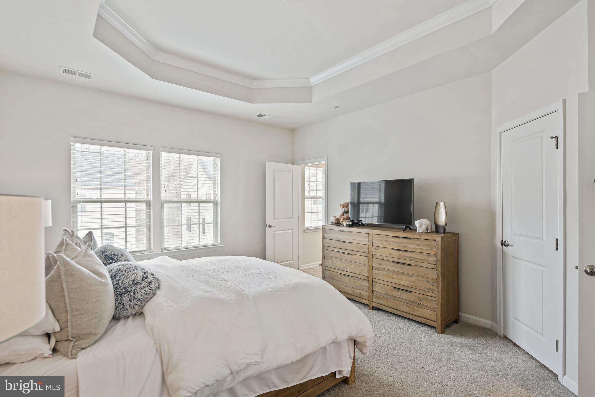 10012 Sandy Run Road Baltimore, MD 21220 - Photo 32 of 34 a bedroom with a bed and a television