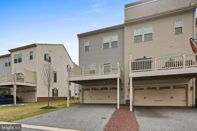 a front view of a house with a garage