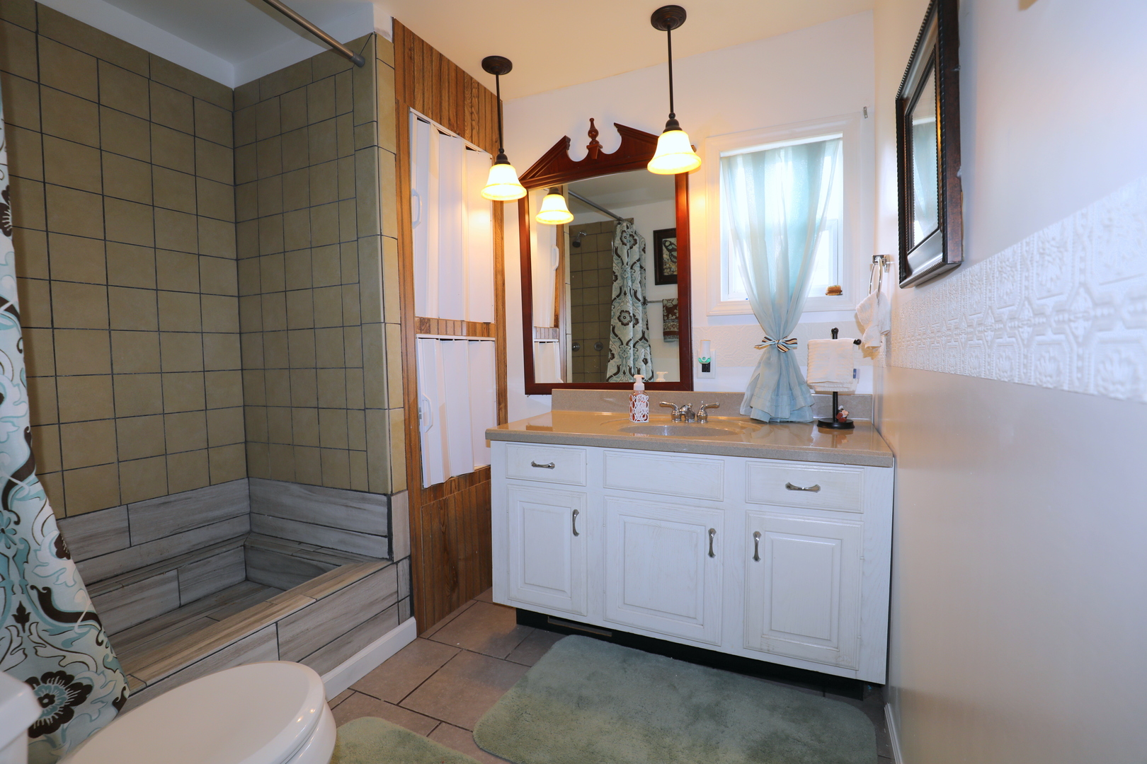 240 Fox Lane Belvidere, IL 61008 - Photo 13 of 18 a bathroom with a toilet a sink and mirror