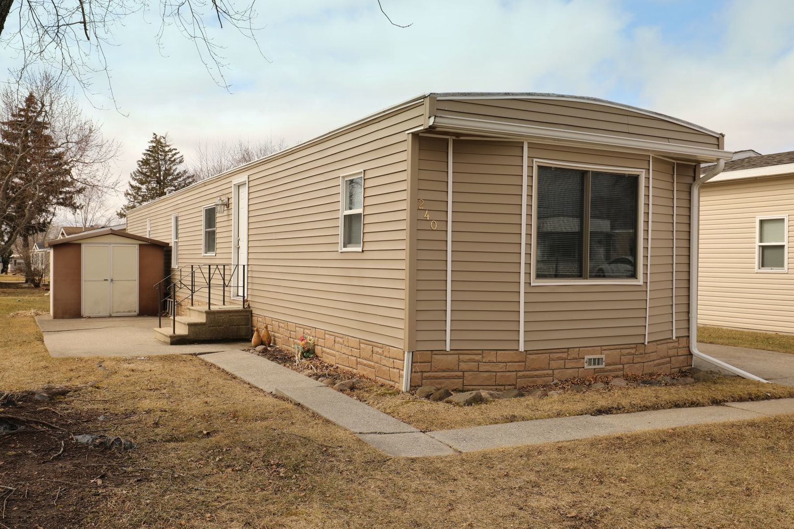 240 Fox Lane Belvidere, IL 61008 - Photo 2 of 18 a front view of a house with a yard