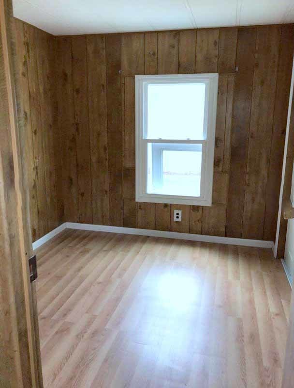 240 Fox Lane Belvidere, IL 61008 - Photo 6 of 18 an empty room with wooden floor and a window