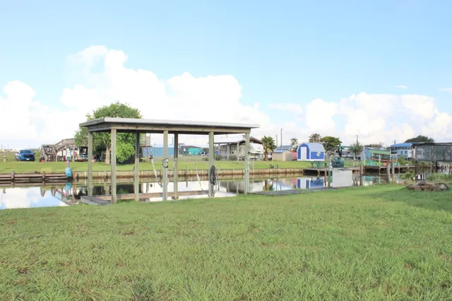 a view of a house with a big yard