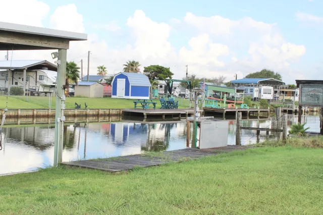a view of a lake with a building in the background