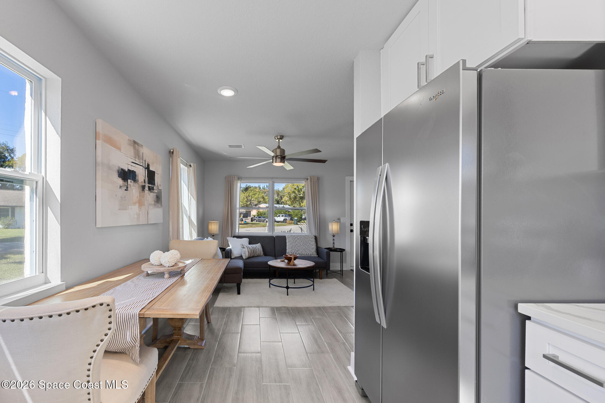 1113 Pinedale Road Rockledge, FL 32955 - Photo 4 of 19 a kitchen with stainless steel appliances granite countertop a refrigerator and a stove top oven