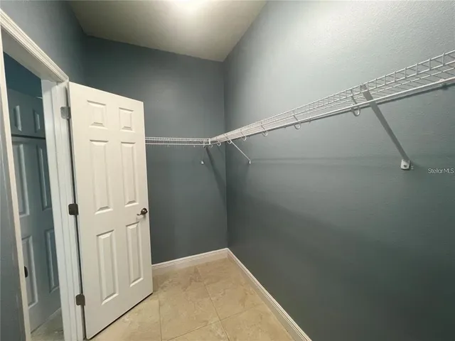 a view of a room with racks on the wall