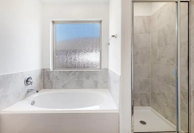 a bathroom with a bathtub