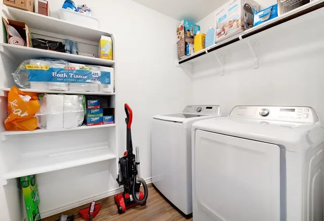 a utility room with dryer and washer