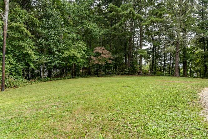 2853 Chimney Rock Road Hendersonville, NC 28792 - Photo 30 of 36 a view of a yard