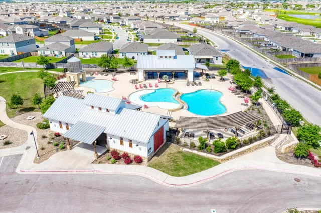 an aerial view of a swimming pool