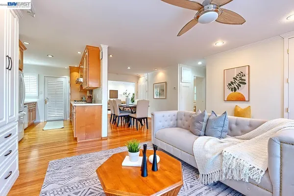 a kitchen with a sink cabinets and a window