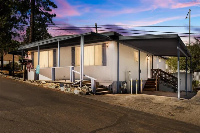 a view of a car park in front of a building