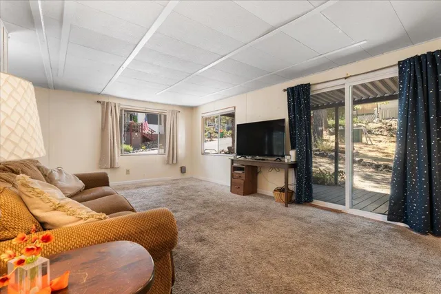 a bedroom with a bed and a lamp