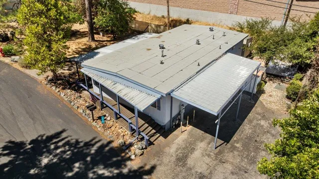 a view of balcony with wooden floor