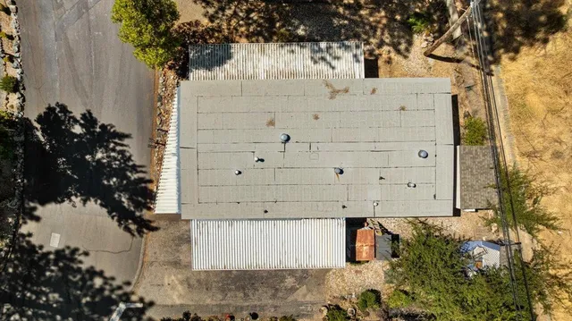 a street sign that is on a tree
