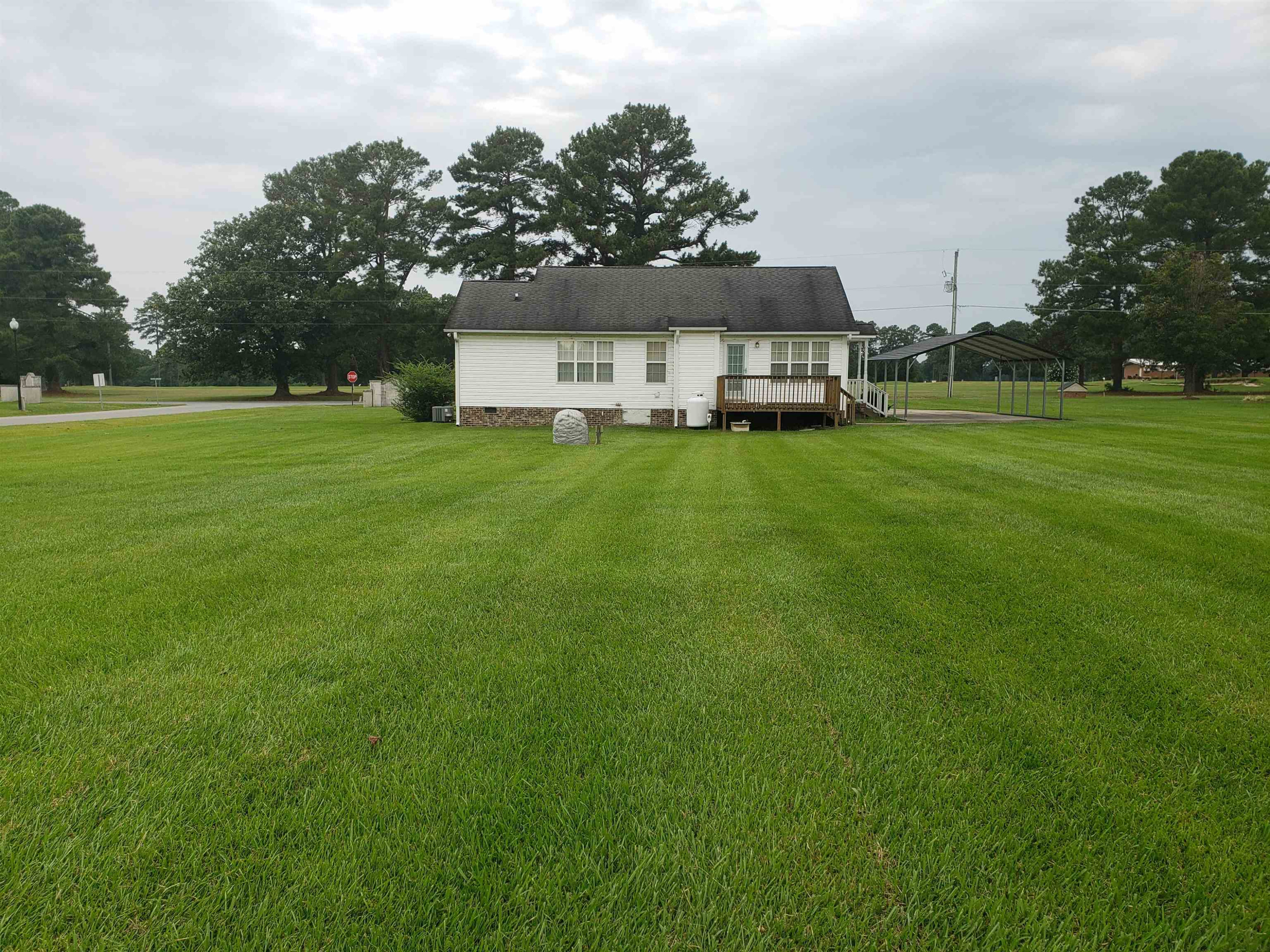 340 Parrish Memorial Road Selma, NC 27576 - Photo 17 of 17 a view of a house with a big yard