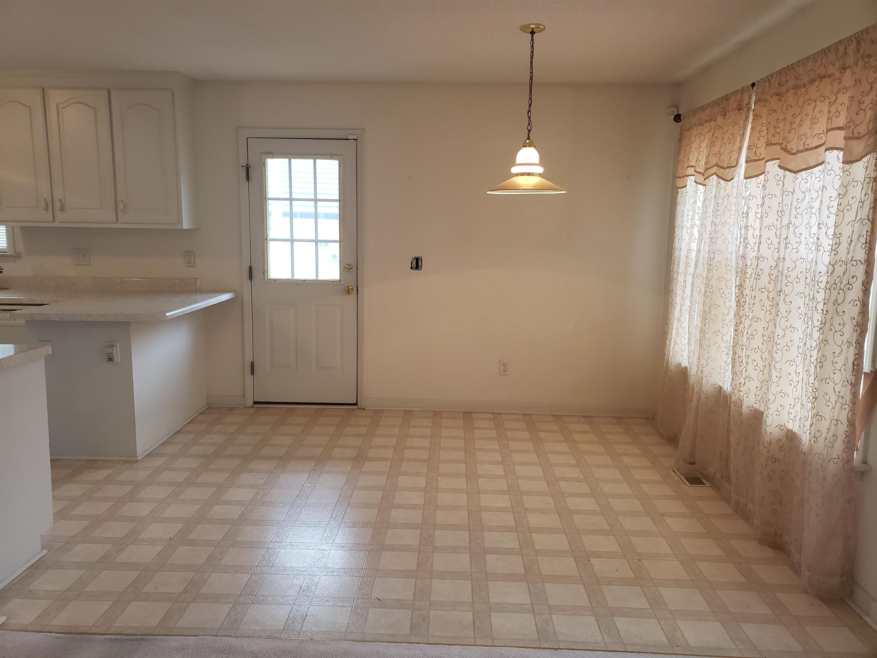 340 Parrish Memorial Road Selma, NC 27576 - Photo 8 of 17 a view of an empty room with a window