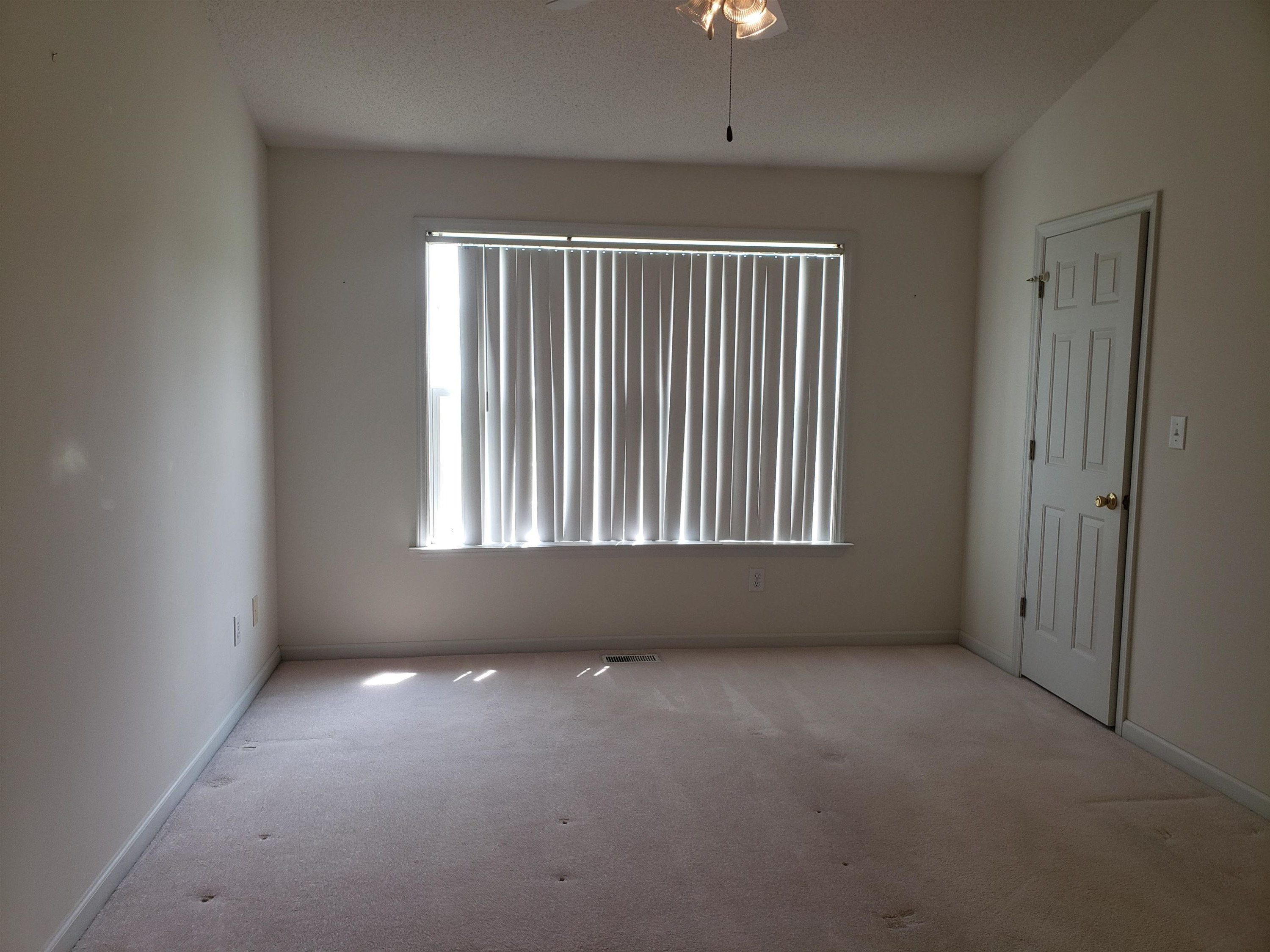 340 Parrish Memorial Road Selma, NC 27576 - Photo 10 of 17 an empty room with windows