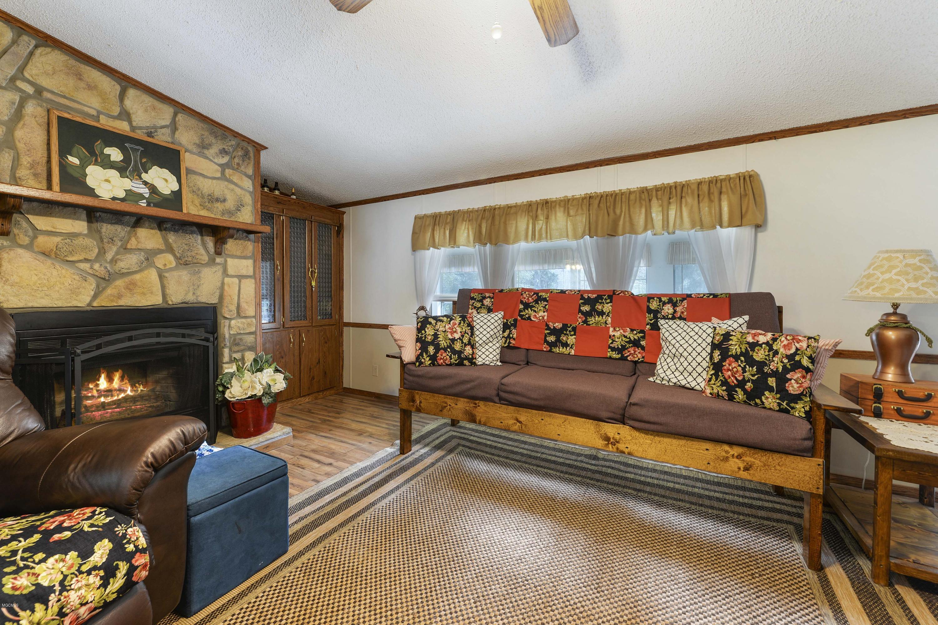 211 Price Road Perkinston, MS 39573 - Photo 9 of 41 Living Room