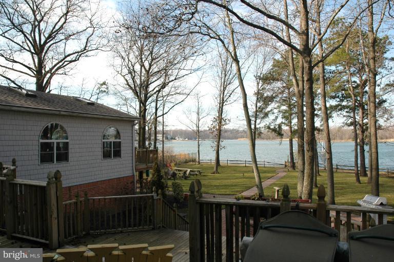 5179 Mountain Road Pasadena, MD 21122 - Photo 14 of 30 View from deck overlooks lovely yard.