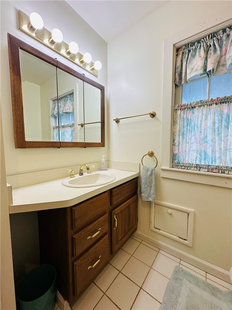 263 East Genesee Street Auburn, NY 13021 - Photo 34 of 50 The 2nd floor full bath and functional laundry chute!